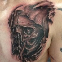 Interesting unusual black ink monster face tattoo on chest