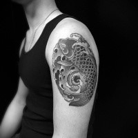 Japanese traditional black ink shoulder tattoo of carp fish in waves