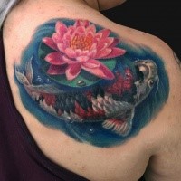 Japanese traditional style colored scapular tattoo of carp fish with flower