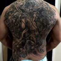 Large black and gray style whole back tattoo of fantasy creepy warrior on horse