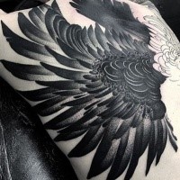 Large black and white eagle tattoo on back