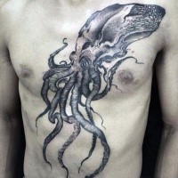 Large black and white octopus tattoo on chest