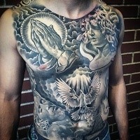 large black and white very detailed religious style tattoo on chest