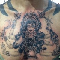 Large black ink chest tattoo of Hinduism Goddess with eye
