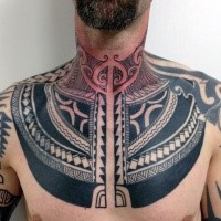 Large black ink chest tattoo of Polynesian ornaments