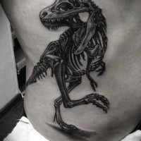 Large black ink engraving style side tattoo of dinosaur skeleton