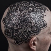 Large black ink head tattoo of gorgeous flower