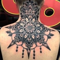Large black ink old school floral tattoo on back and neck