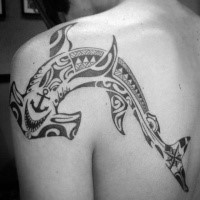 Large black ink Polynesian style shoulder and back tattoo of hammerhead shark stylized with anchor and star