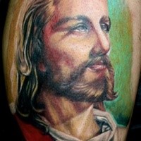 Large colored tattoo of Jesus portrait