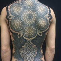 Large colored whole back tattoo of incredible ornamental flower