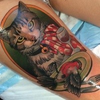 Large funny looking cat portrait tattoo on thigh stylized with bird on plate