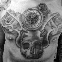 Large gray washed style whole chest tattoo of human skull with compass and flowers