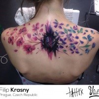 large illustrative style upper back tattoo of various flowers