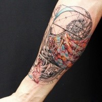 Large multicolored arm tattoo of mysterious ornaments