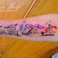 Large multicolored forearm tattoo of beautiful worlds most beautiful structures