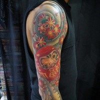Large neo japanese style colored sleeve tattoo of daruma doll with waves and flowers