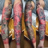 Large old school style colored sleeve tattoo of various ornamental flowers
