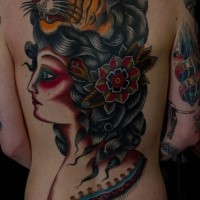 Large old school style colored whole back tattoo of woman face with tiger face and flower