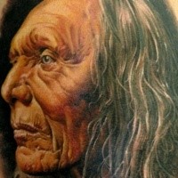 Large realism style colored tattoo of old Indian man