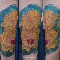 Large realistic looking colored forearm tattoo of big flower