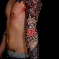 Large stippling style colored sleeve and shoulder tattoo of various ornaments