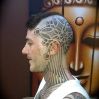 Large stippling style head and neck tattoo of original ornament