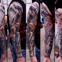 Large very detailed and colored sleeve tattoo of wooden puppet