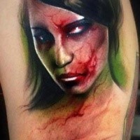 Large very detailed shoulder tattoo of monster woman face