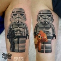 Lego style funny looking arms tattoo of Storm trooper with blaster and small bear