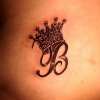 Letter b and crown tattoo