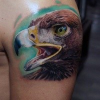 Lifelike American traditional colored eagle's head 3D realistic arm top tattoo in realism style