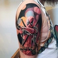 Lifelike colored Deadpool with pistols tattoo on shoulder