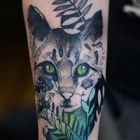 Lifelike nice looking painted by Joanna Swirska cat tattoo stylized with leaves