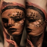 Lifelike very detailed tattoo of woman face with small mask