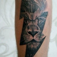 Lightning symbol shaped forearm tattoo combined with lion face