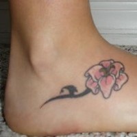 Lily flower tribal tattoo on foot