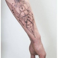 Linework style black ink forearm tattoo of creative geometrical fiures