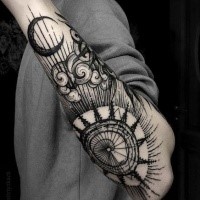 Linework style cool painted forearm tattoo of big sun and moon with cloud