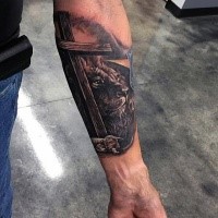 Lion and lamb under big wooden cross religious realistic forearm tattoo