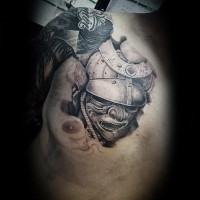 Little 3D style black and white samurai warrior mask tattoo on chest
