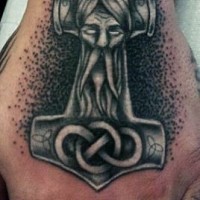 Little black and white anchor with mystic man tattoo on fist