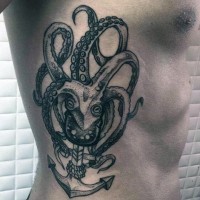 Little black and white nautical themed octopus with anchor tattoo on side
