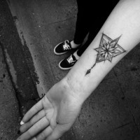 Little black ink forearm tattoo of nice flower combined with geometrical figure
