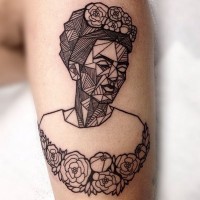 Little black ink geometrical tattoo on forearm