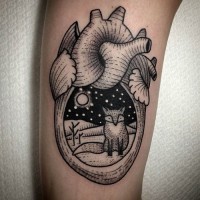 Little black ink heart shaped tattoo on arm stylized with fox
