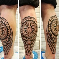 Little black ink Polynesian style tattoo on leg