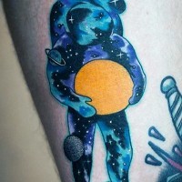 Little colored spaceman stylized with solar system tattoo on arm