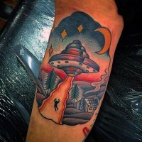 Little colorful alien ship with human in night sky tattoo on arm