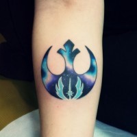 Little colorful Star Wars Rebel Alliance emblem tattoo of forearm stylized with little Jedi Order emblem